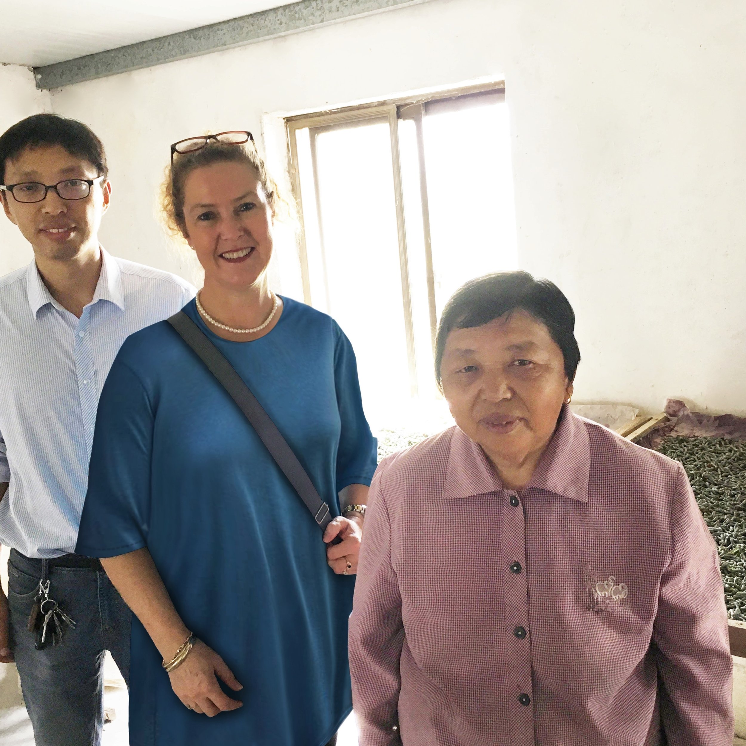 Laurian with silkworm farmers 