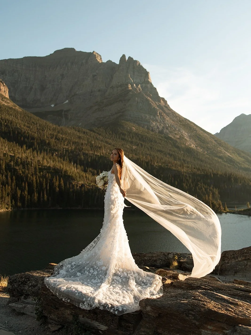 Our bride, @elizabeth_phillips had the most gorgeous &amp; intimate wedding celebration while looking stunning in the Atlas gown by @madewithlovebridal 🏔️🥂🤍

📸: @photographybybrogan 
&bull;
&bull;
&bull;
&bull;

#weddingtrends #weddingdress #wedd
