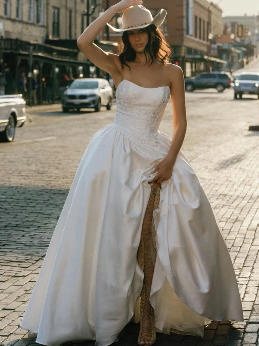 Meet Fern by @watters &mdash; a modern ball gown with an unmistakably romantic edge. Fine floral beading climbs the bodice then cascades from the waist into the skirt, creating a sense of movement and depth from every angle. A dramatic hip pouf adds 