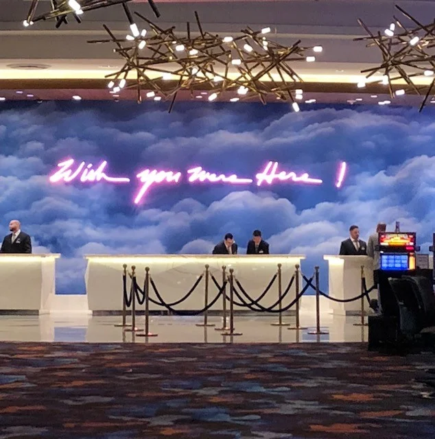 Wish You Were Here neon sign located at the front desk – collaboration between Los Angeles artist Keegan Gibbs and Berlin-based American light artist Olivia Steele