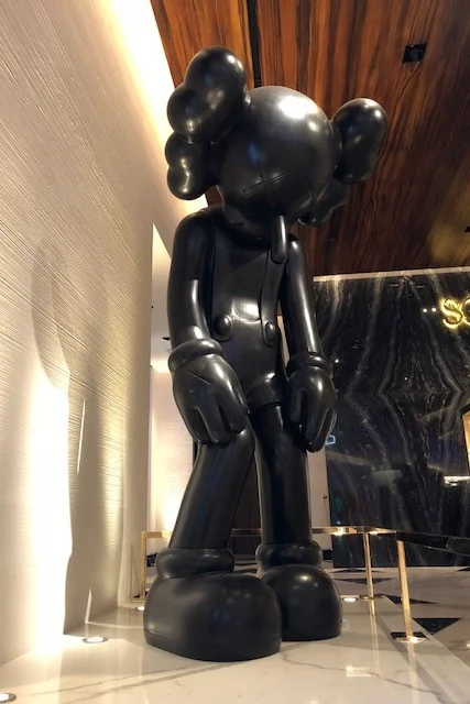 Small Lies by Kaws - located outside Scotch 80
