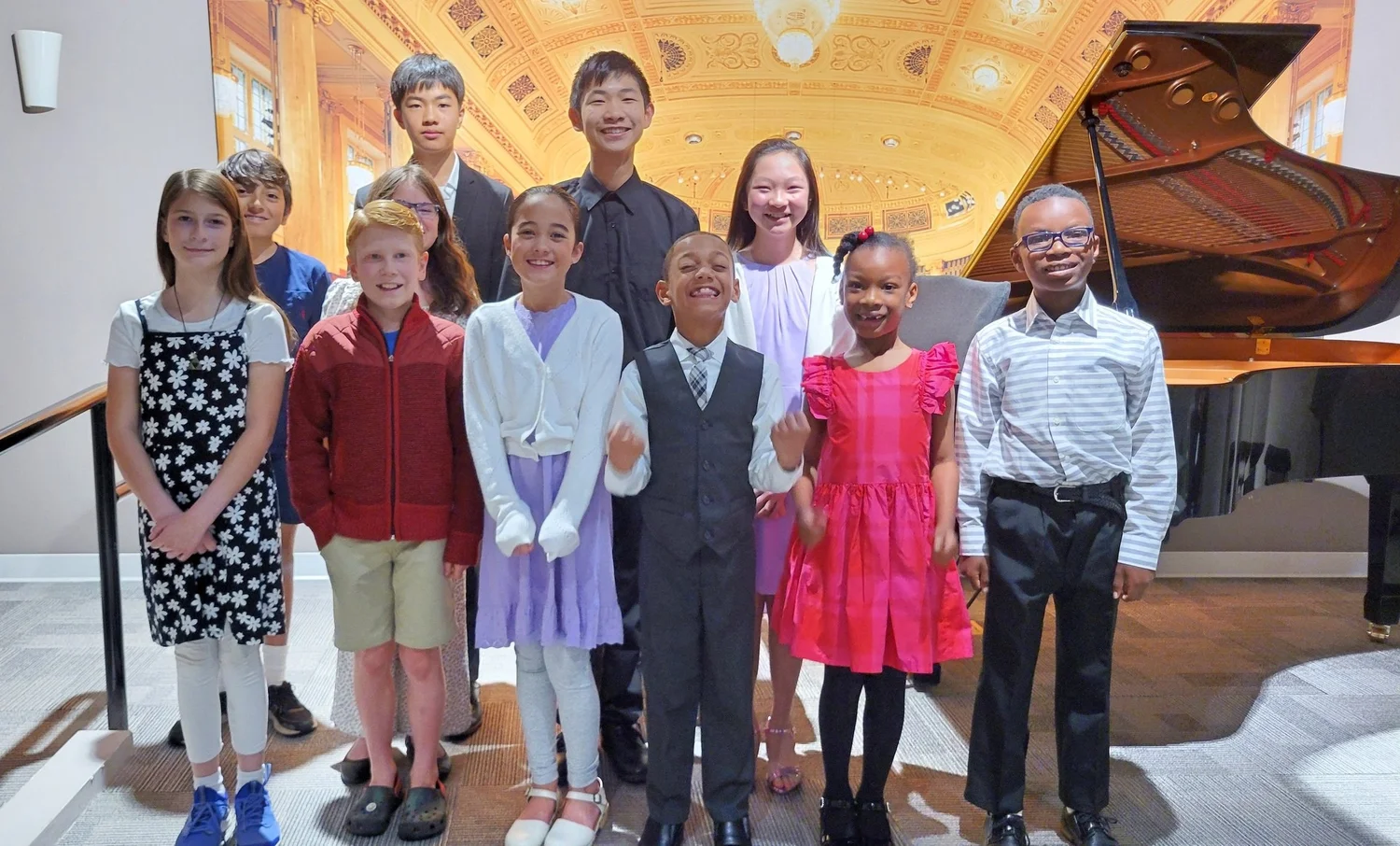 Heart Beats students celebrating together after a school recital