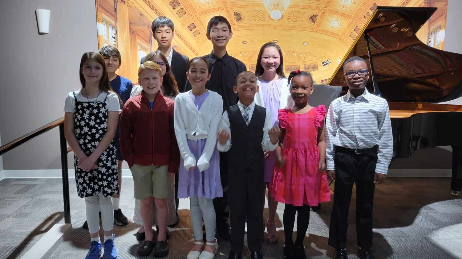 Heart Beats students and teachers celebrating after a February recital