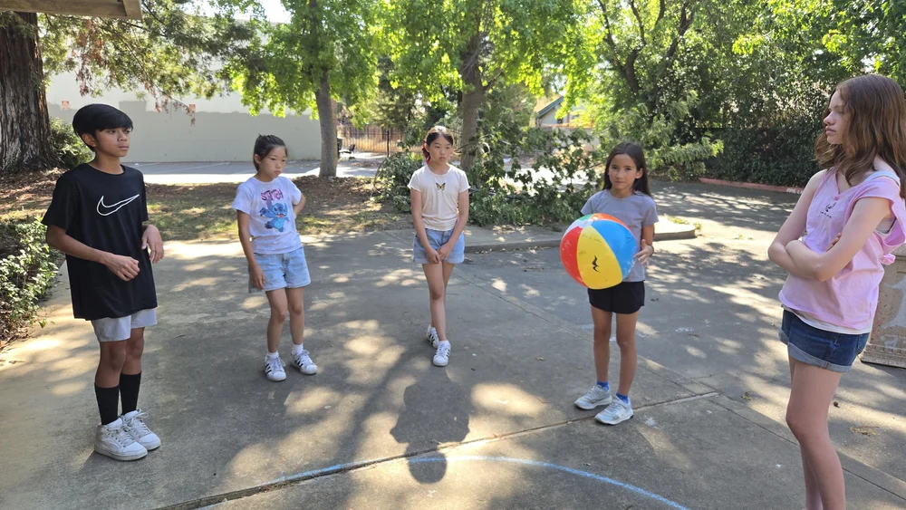 Heart Beats students exploring scales through an outdoor team game