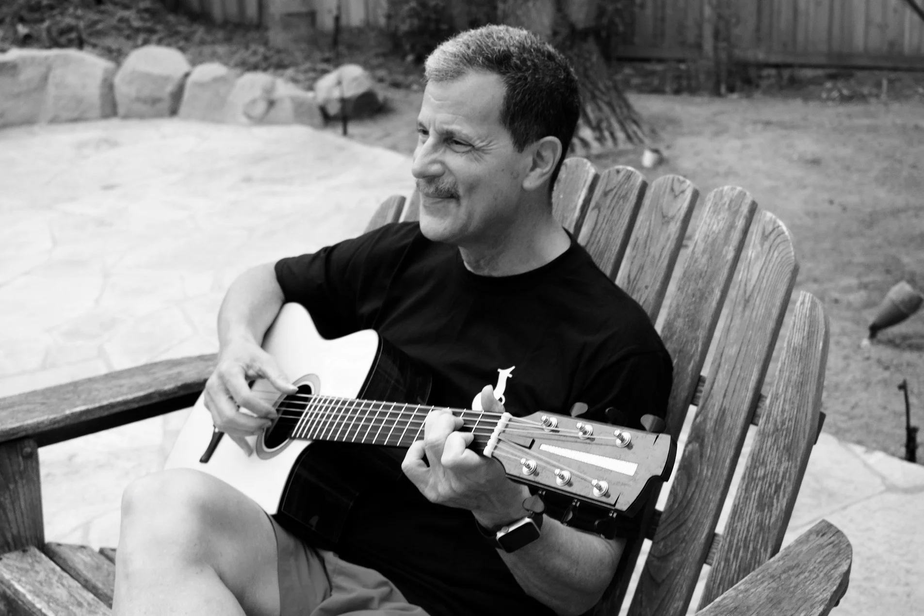 Customer with a custom handmade hand built Tom Sands acoustic guitar