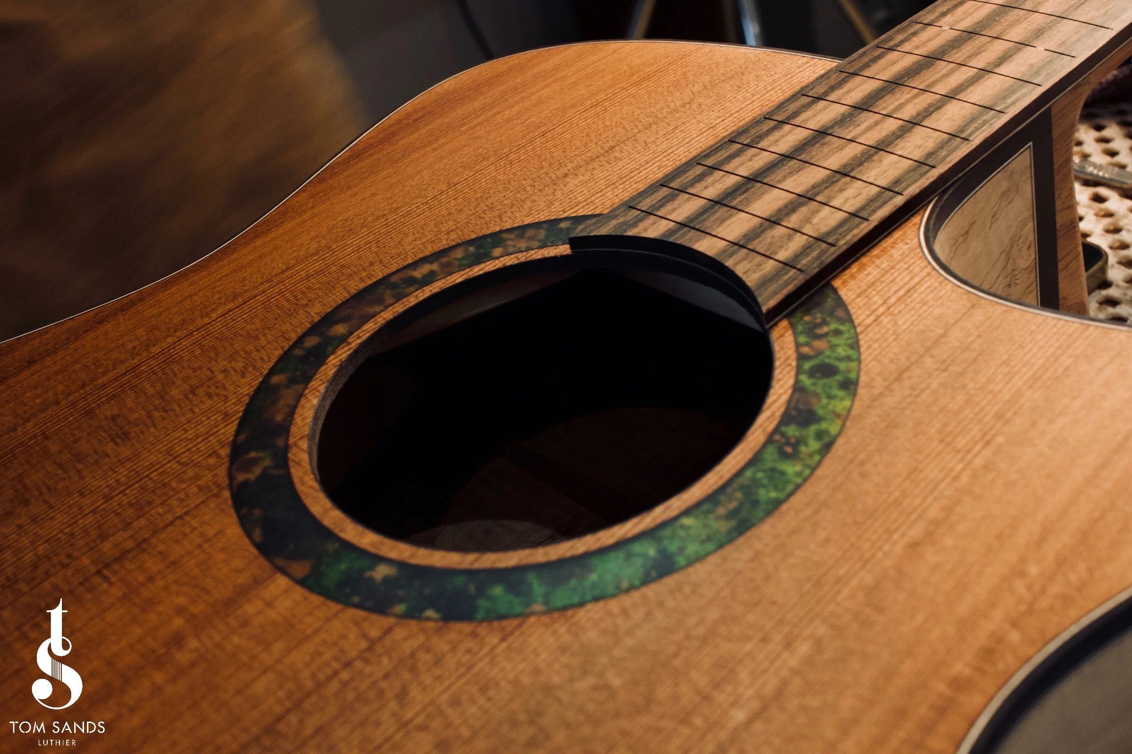 A closer look at the patinated green copper rosette.