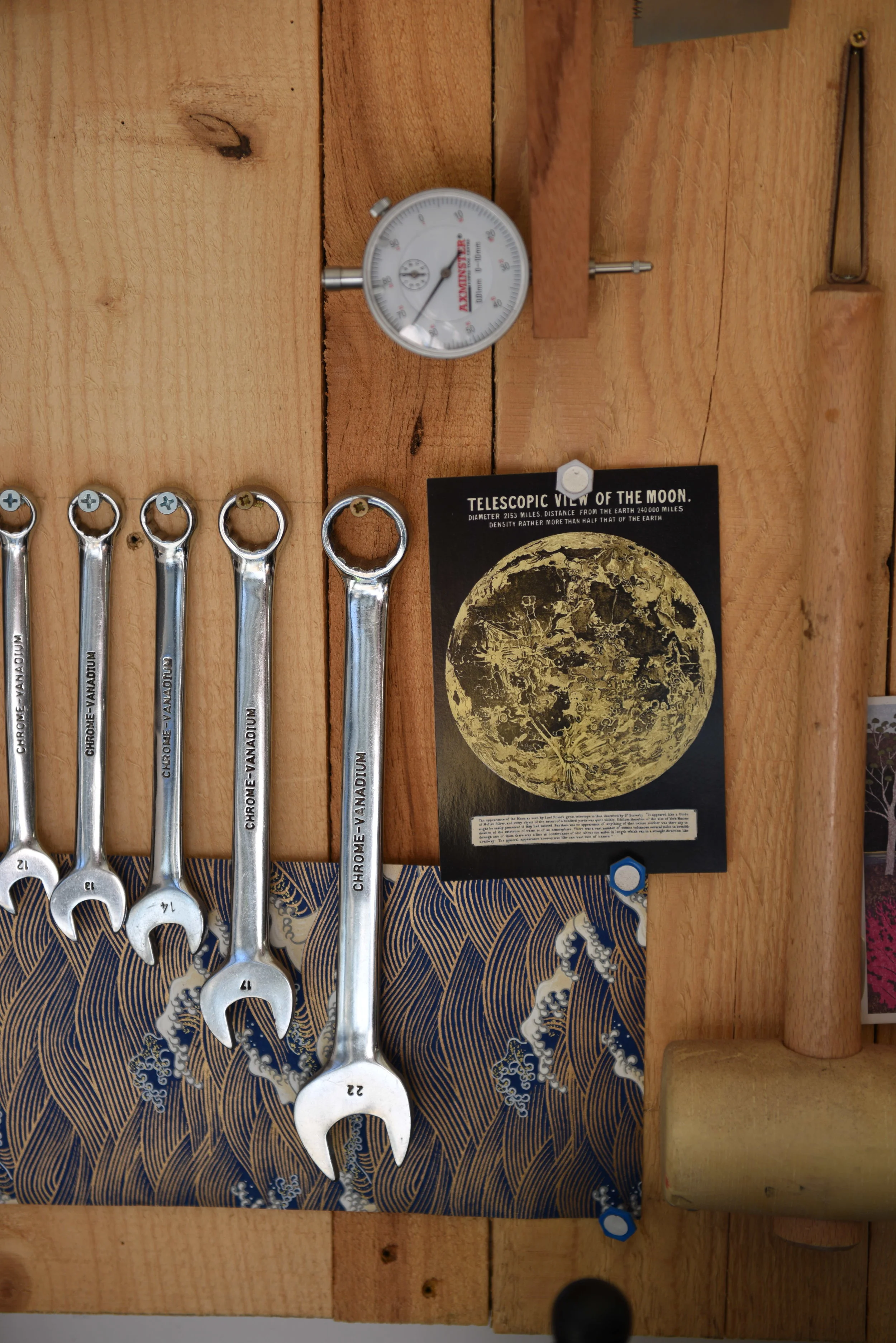 Palletboard spanner detail, ft. telescopic view of the moon and wave pattern.