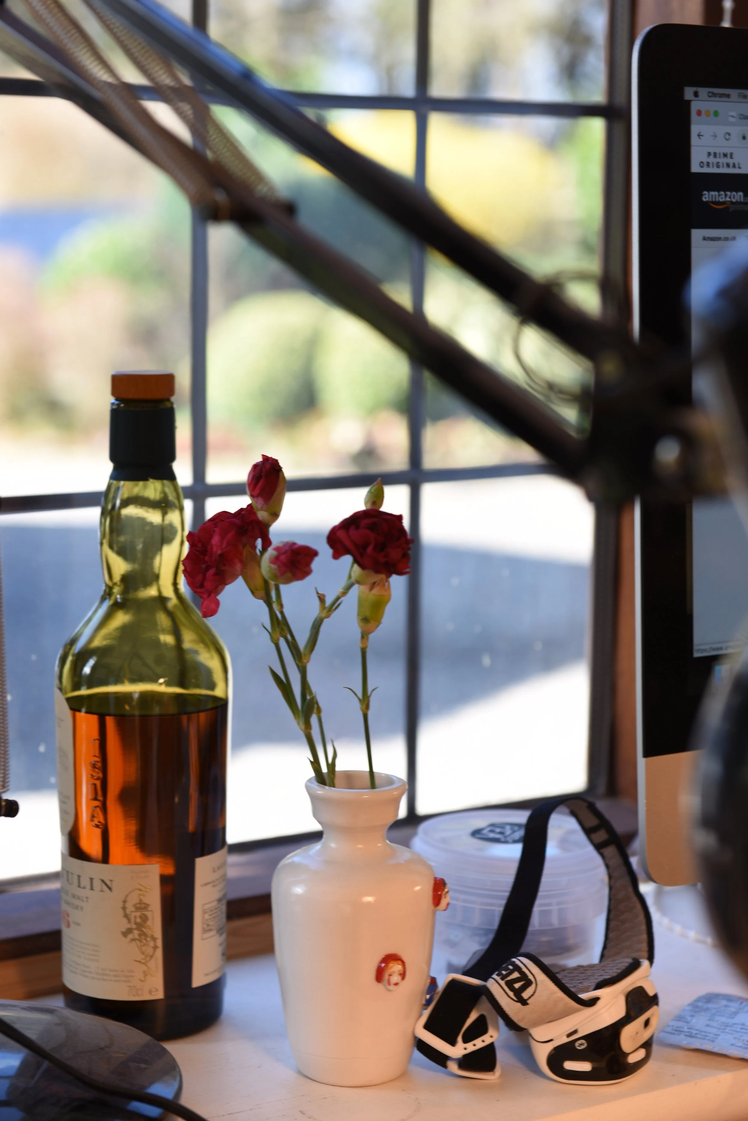 Whisky for those late night sessions, vase by Michelle Sparnicht, headtorch