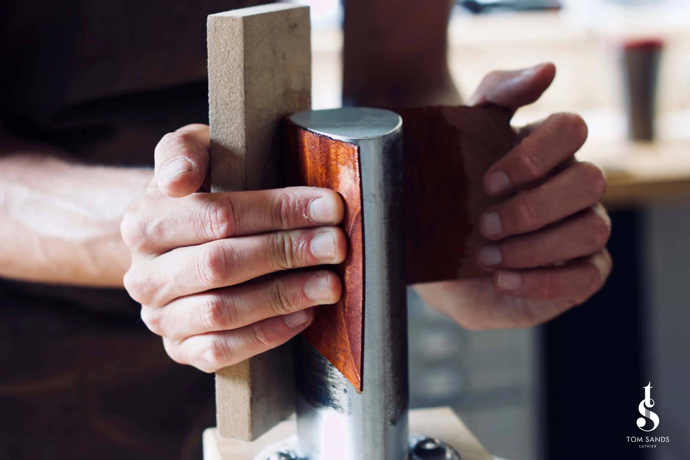 Bending the cutaway with the hand bending iron.