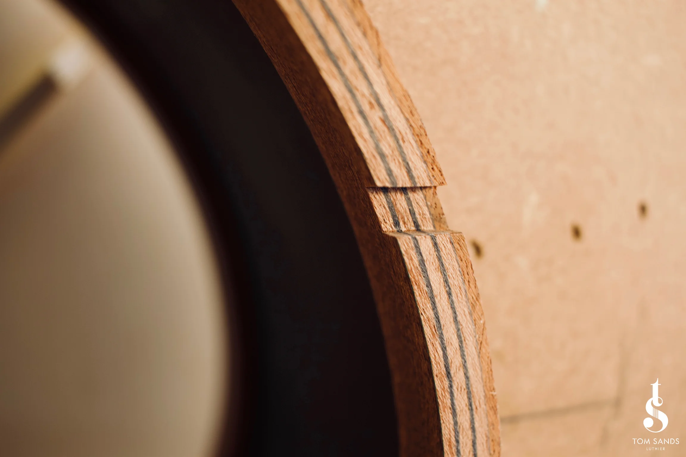Hand cut notches in the rim assembly to hold the back braces.
