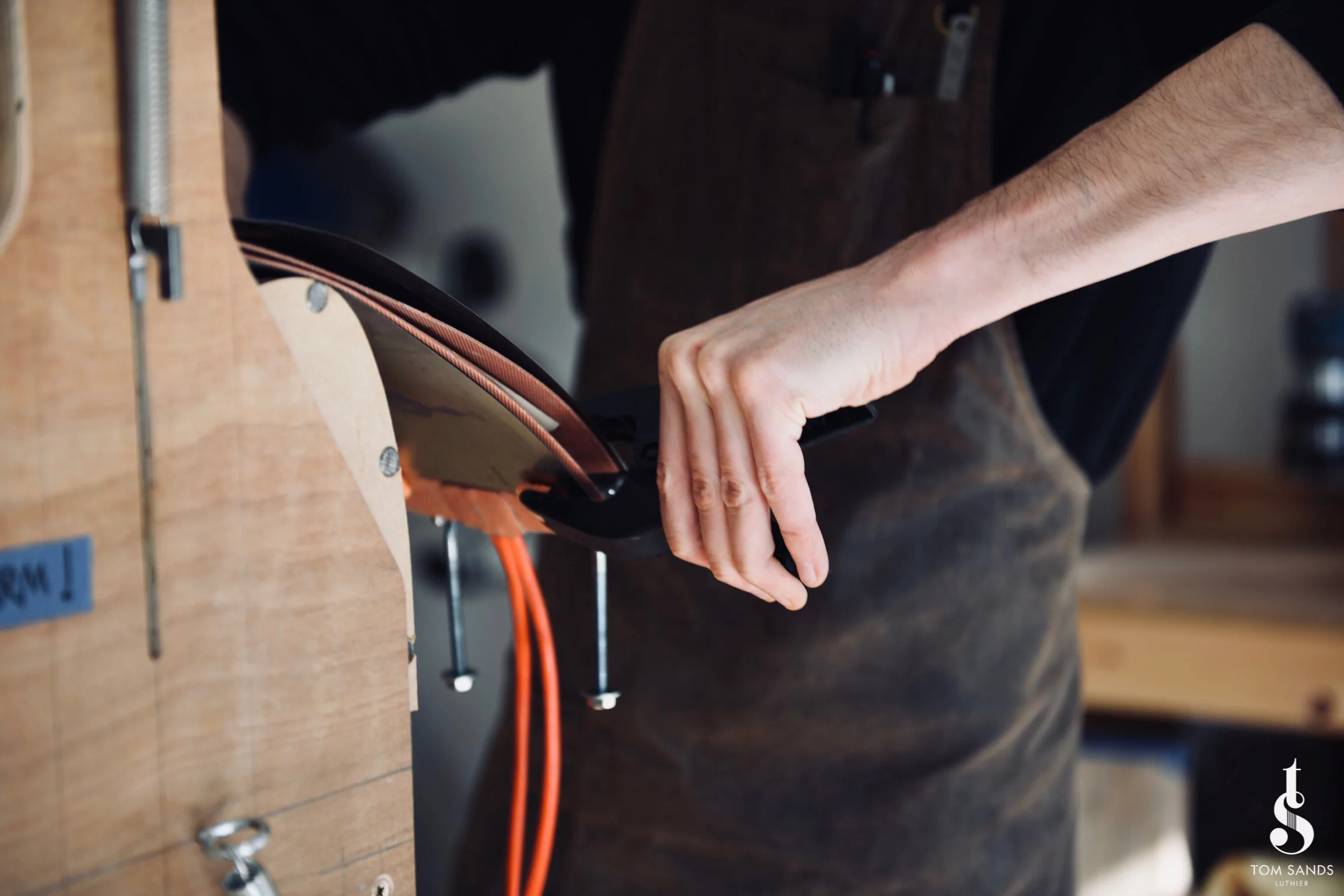 Bending the Cocobolo, armed with paper towel and alcohol (not to drink - we definitely don’t advise that.)