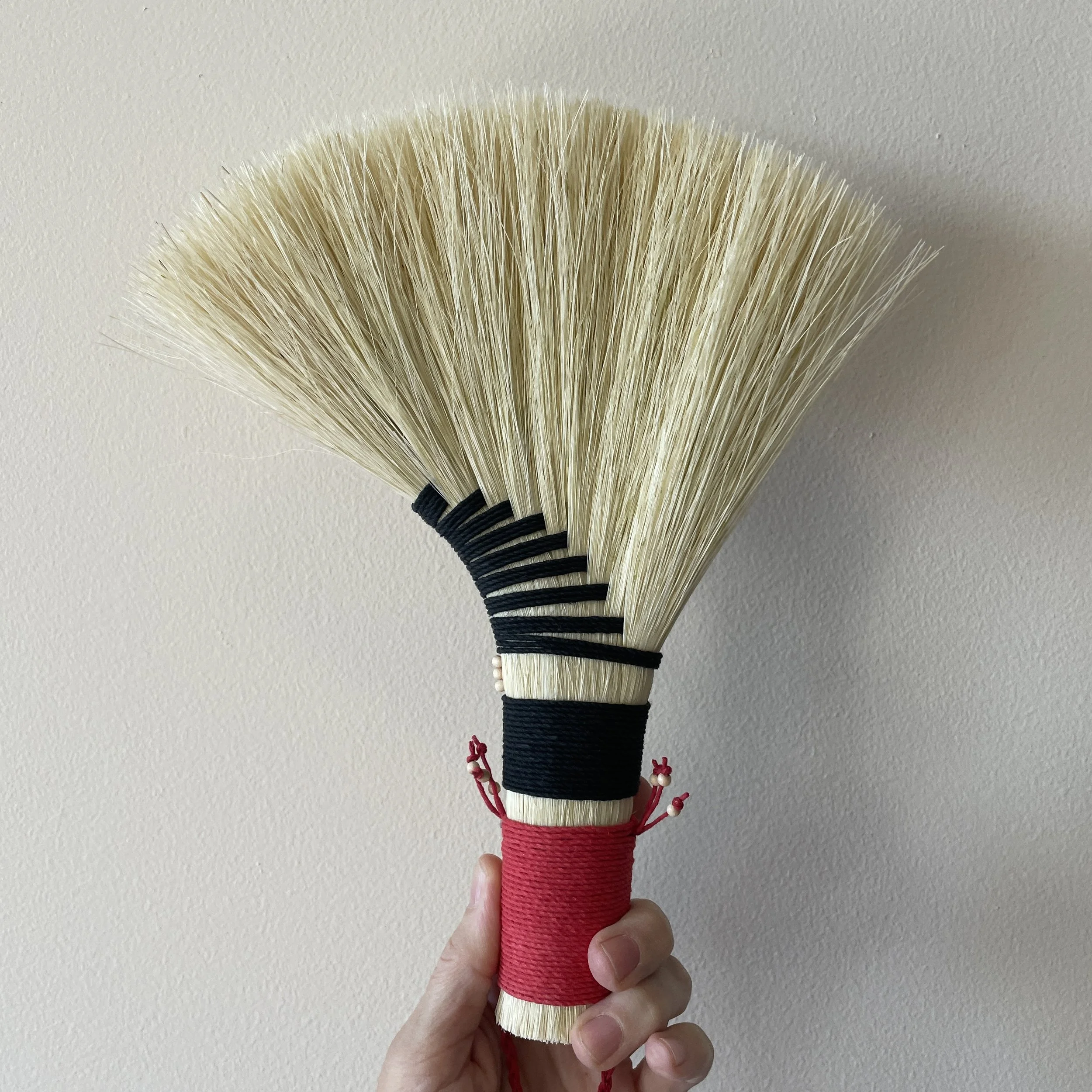 agave hand broom, black and red
