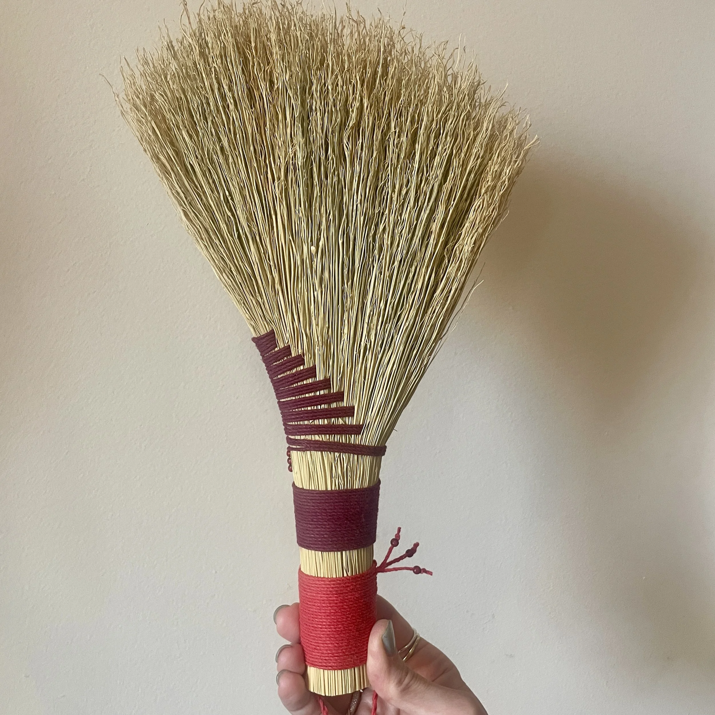 broomcorn broom, burgundy & red