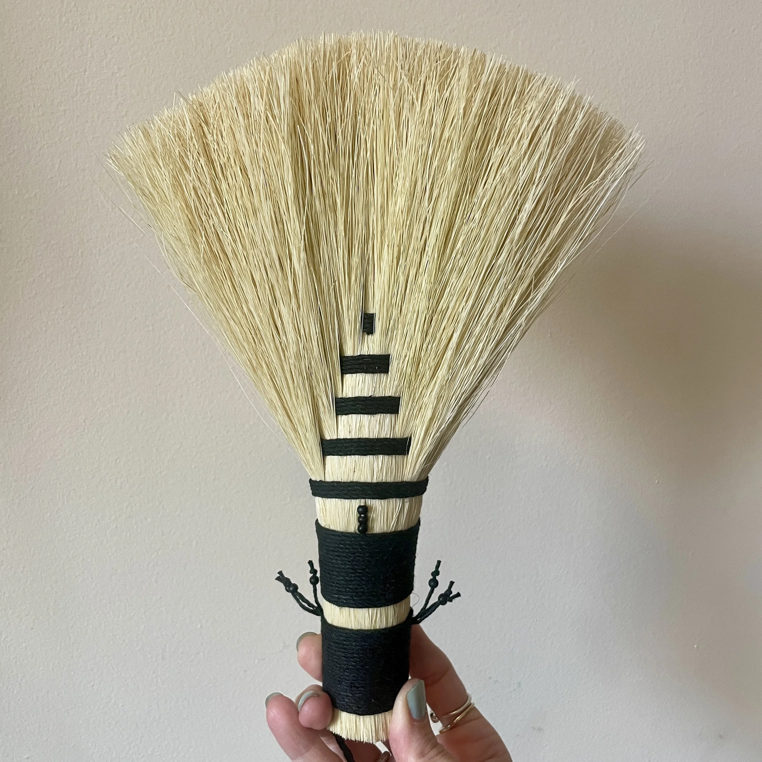 agave hand broom, black