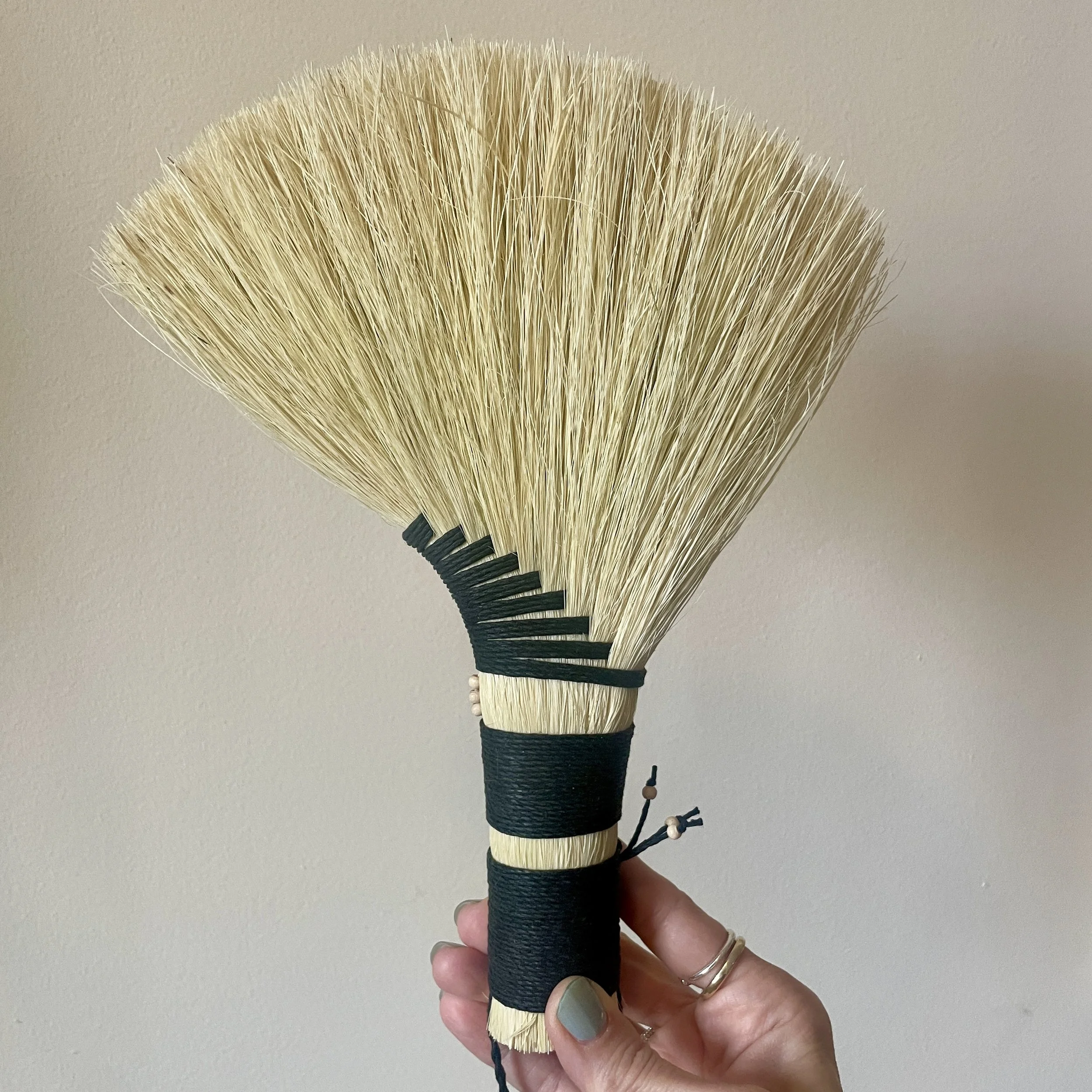agave hand broom, black