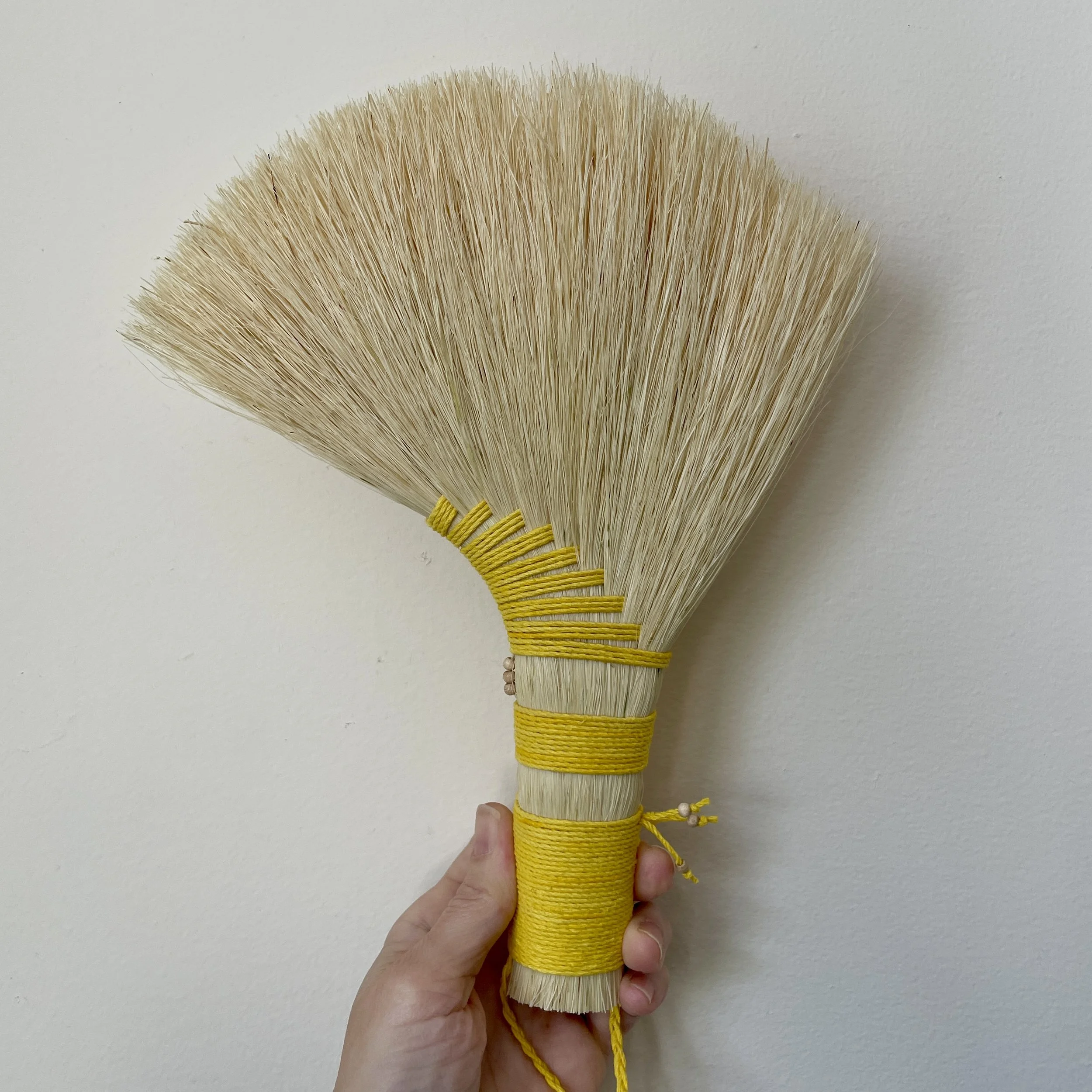 agave hand broom, yellow