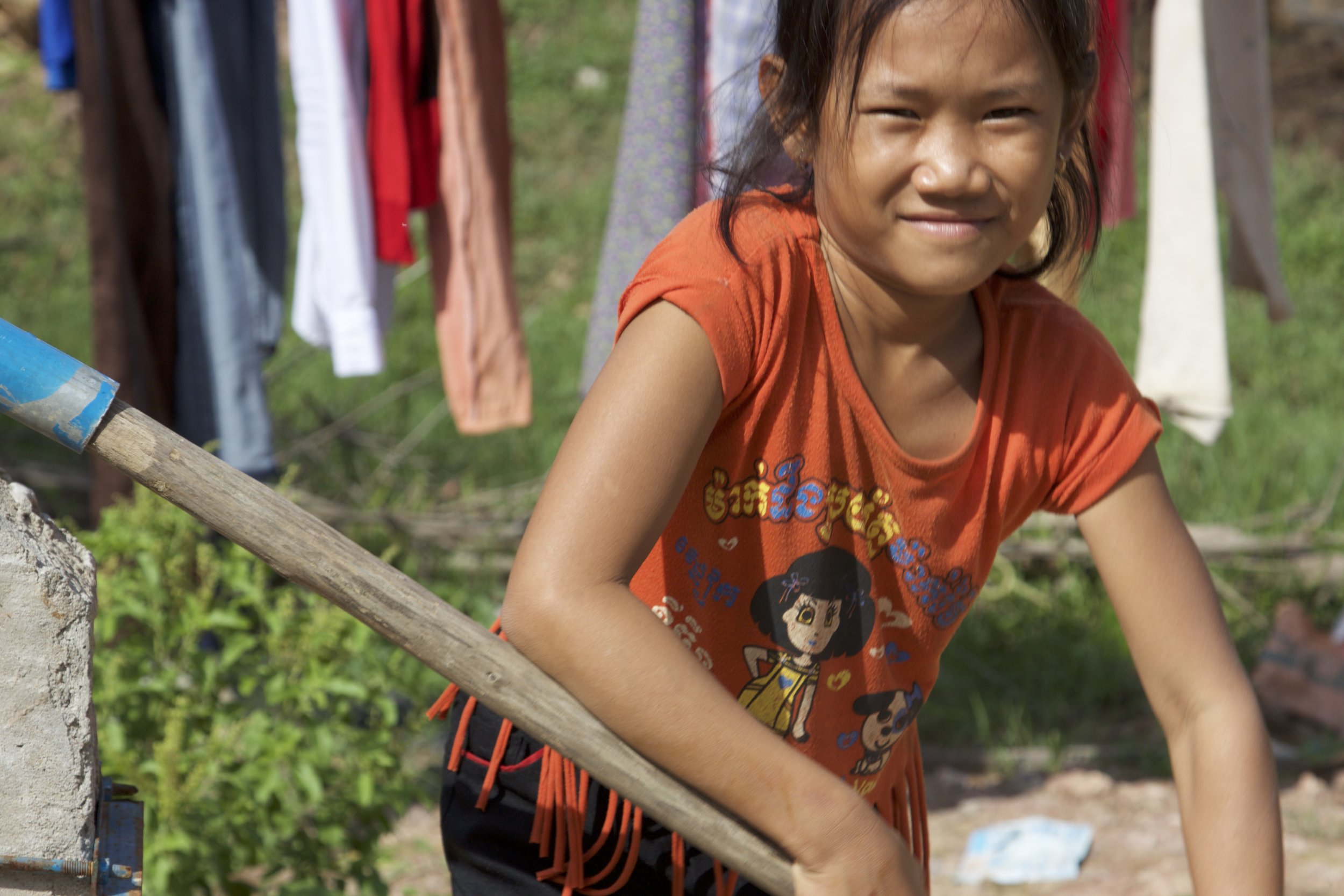 Dy pumps water from her family’s well