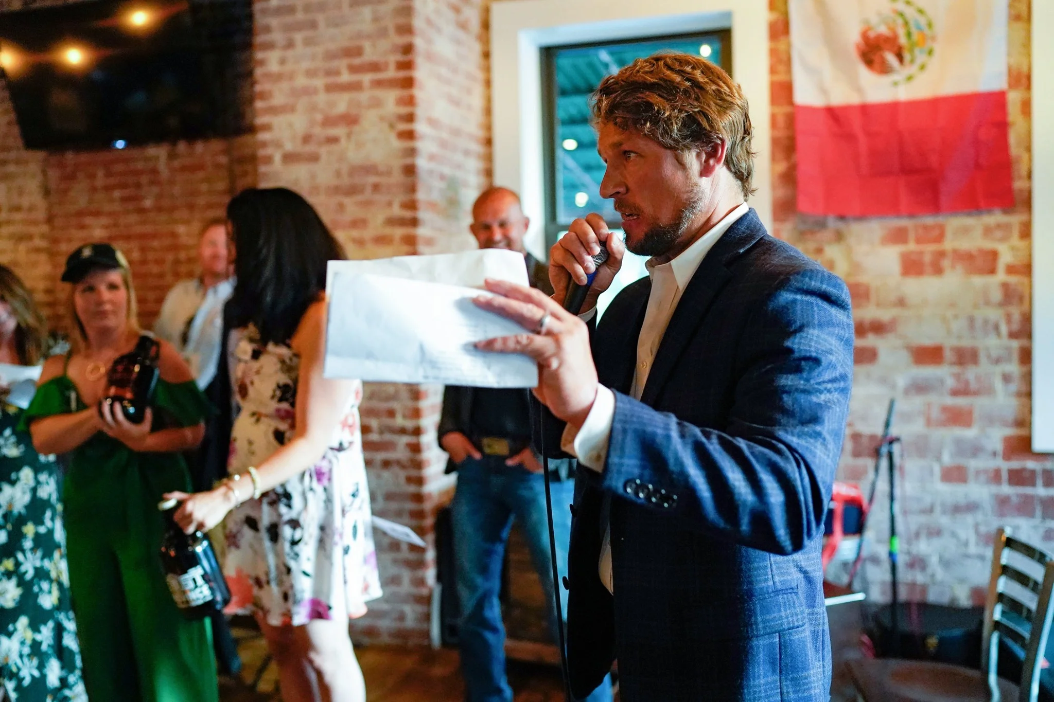 Auctioneer Jesse Miller raising the stakes!