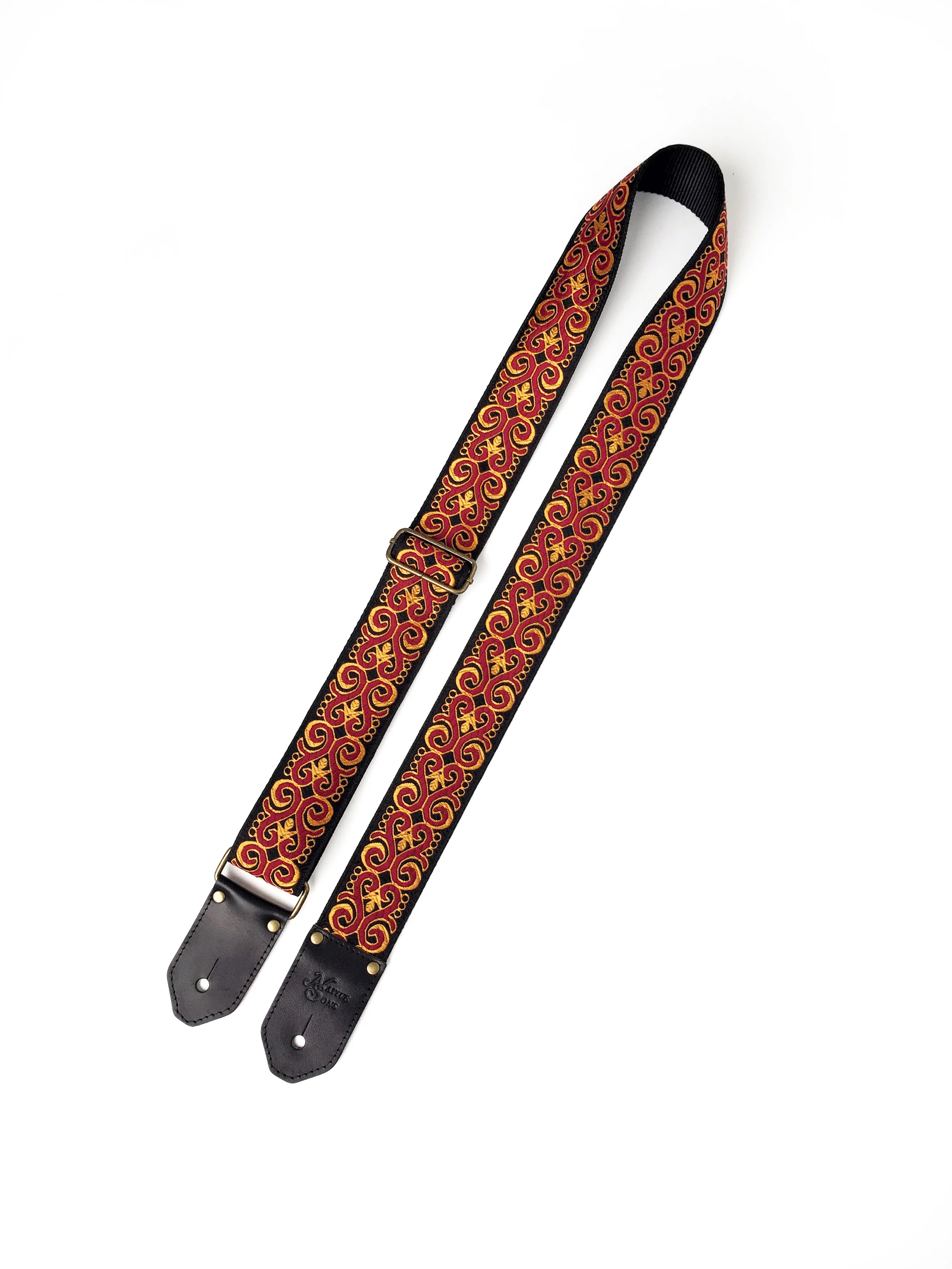 Burgundy, gold and black guitar strap