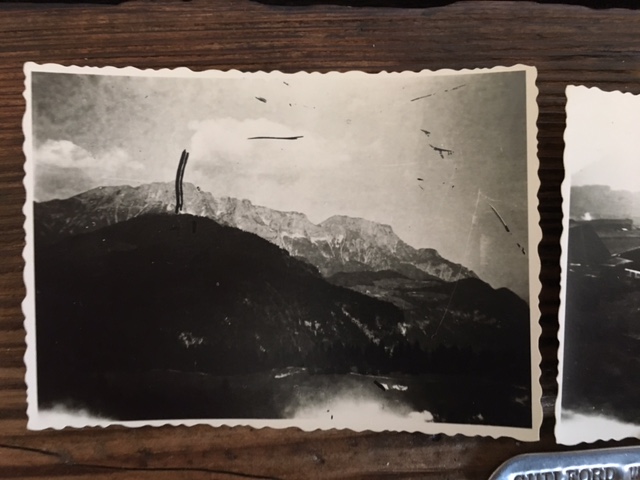 "Berchtesgaden, August 1945. View of the Alps, as seen from the big window. Most of the white is snow, naturally much more beautiful than the picture shows." Taken by Sgt. Guilford W. Condron — a railway conductor in the 735th Railway Operating Battalion, Company C.