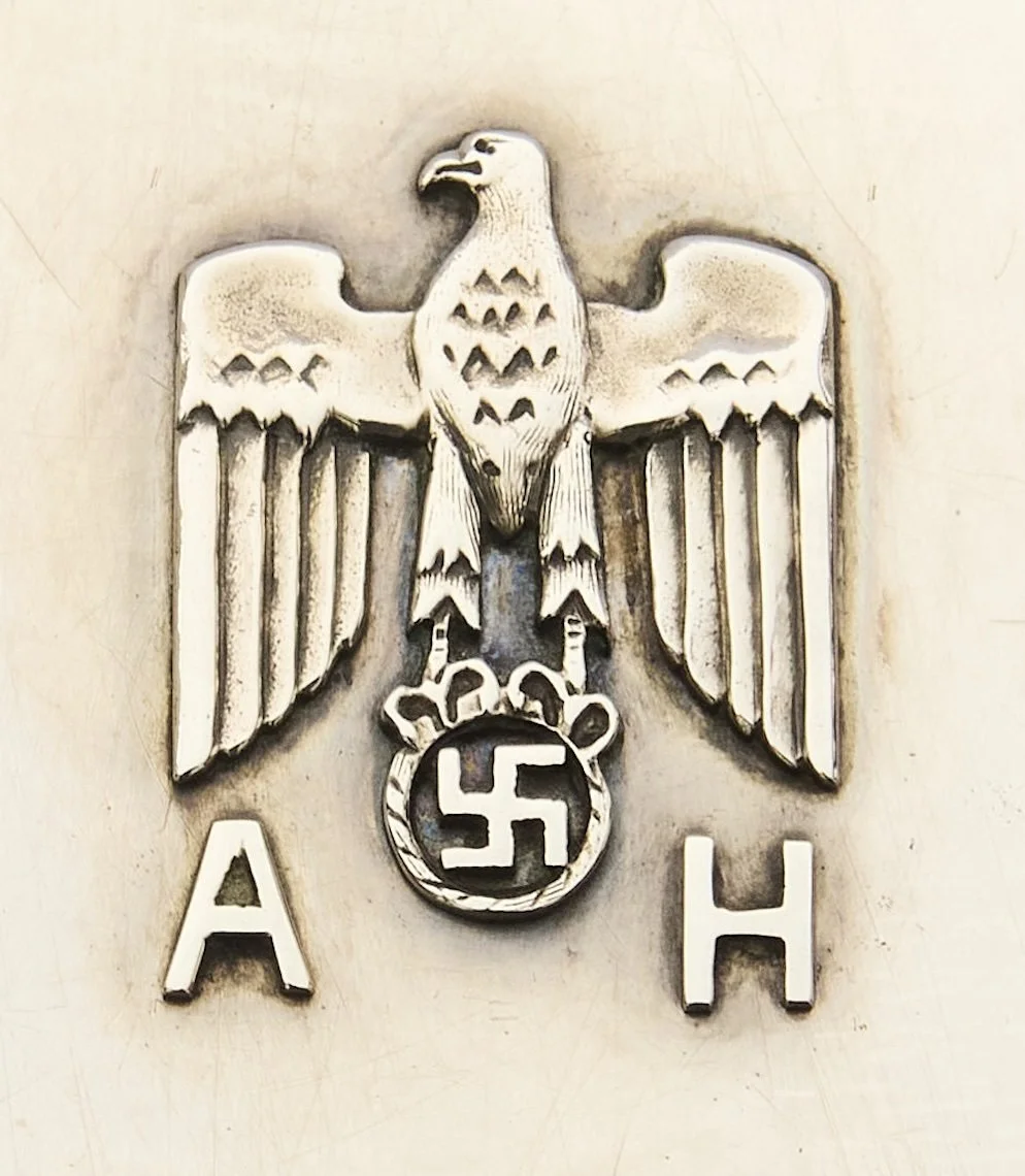 Each box bears a silver monogram. It differs to the type seen most frequently on the cigar and cigarette boxes. I suspect it was an early variation; created before the smoking set monogram became more uniform and standardized. Regardless, each one i