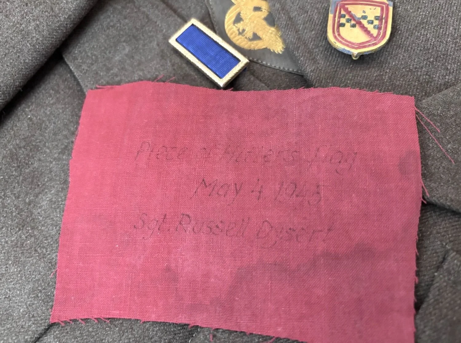  One of only two known fragments of Hitler’s Berghof flag. Staining is likely soot and smoke damage from the April 25 RAF bombing, and subsequent fires started by retreating SS troops. 