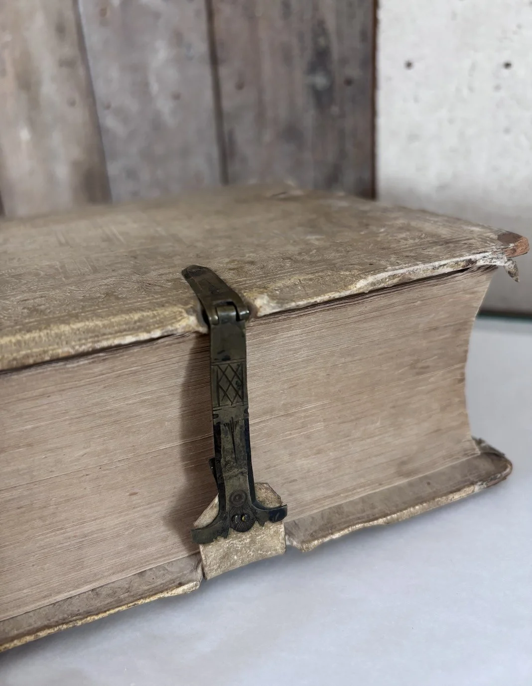 The intricately-designed metal clasps from the book's original Renaissance binding are still functioning, nearly five centuries later.  