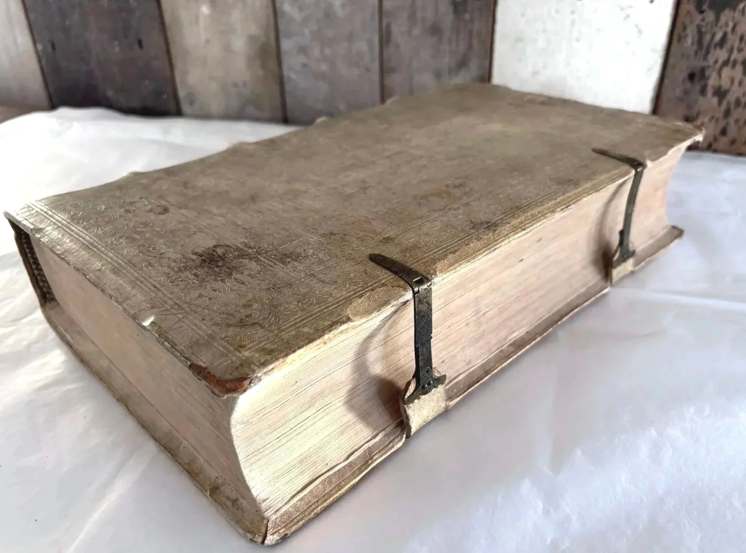  Nearly five centuries old, the book remains in its original pigskin binding over wooden boards, and retains both of its original metal clasps. 