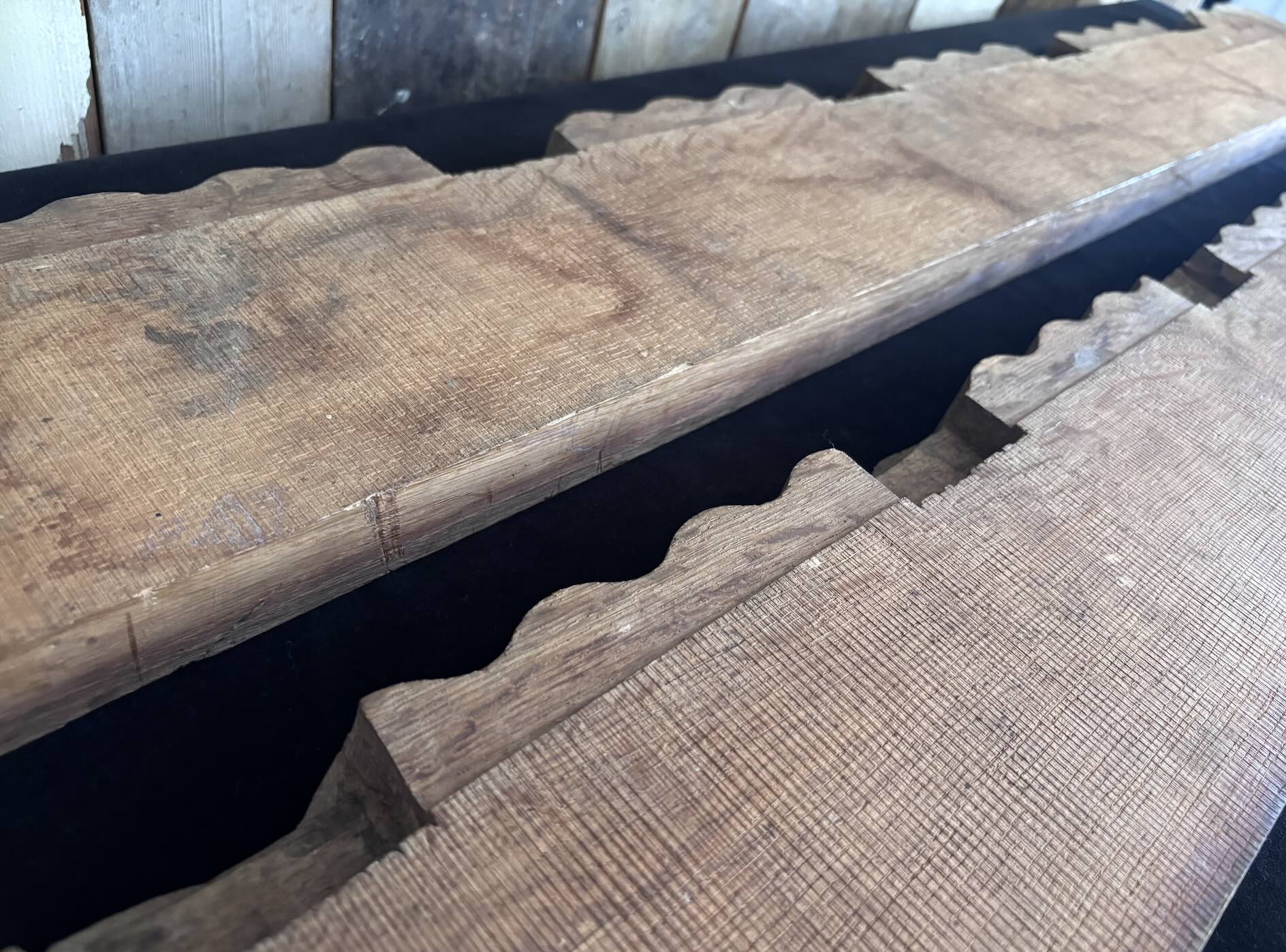  Carved recesses on the back of each panel suggest they were originally designed to slot over rafter ends - most likely part of an SS guardhouse or other SS checkpoint en route to the Berghof.  