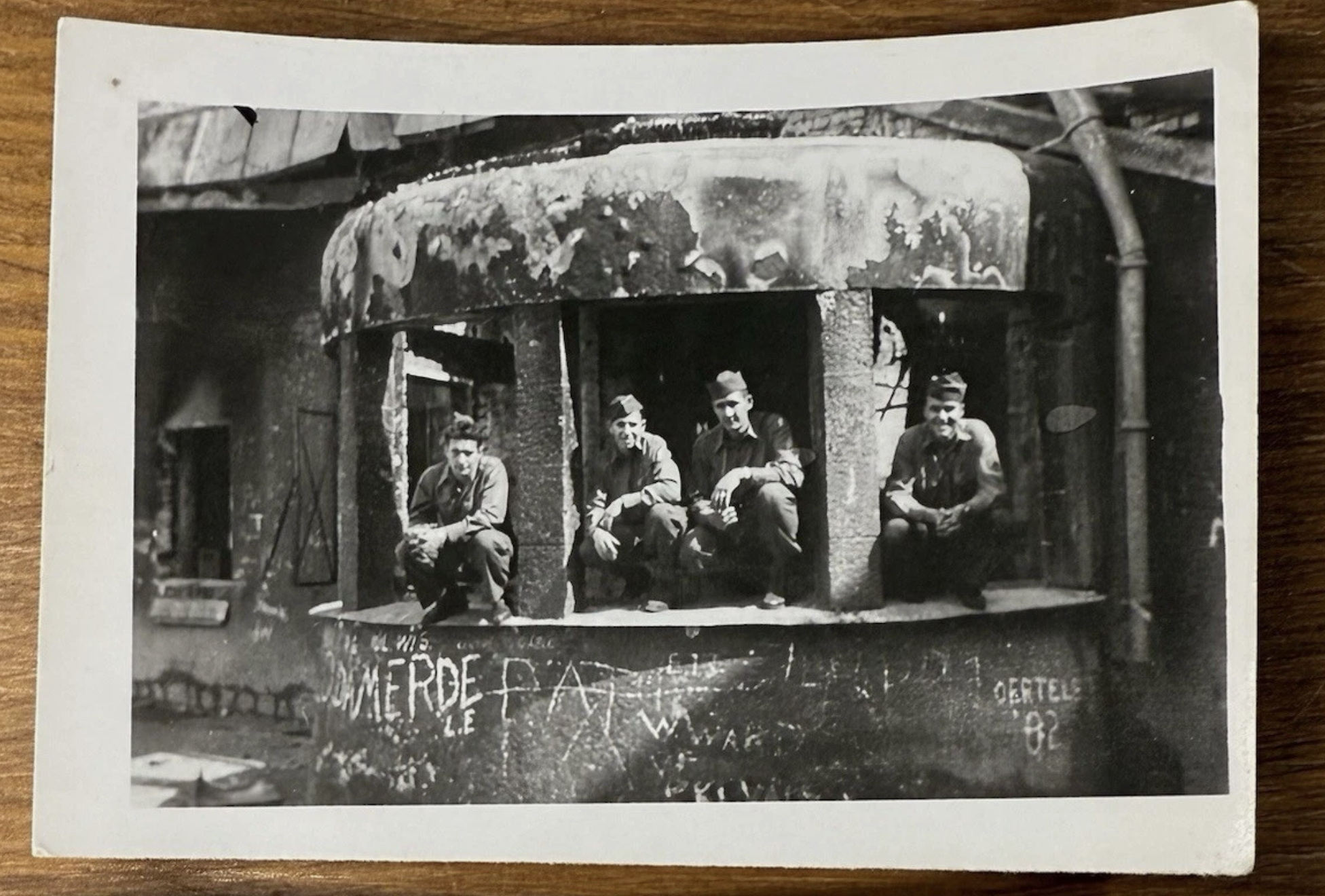  Men of 222nd Inf Reg 42nd Inf Div explore the ruined Berghof 