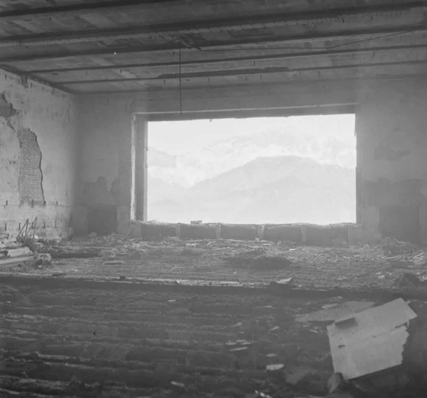  The ruined Great Hall after the war. The glass is long gone, but the vast opening remains: still framing the legendary view of the Untersberg. 