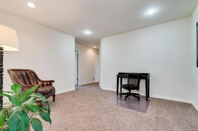 Phil’s office will live in the loft space again. The carpet currently installed is offensive so we dream of swapping it out pretty quickly.