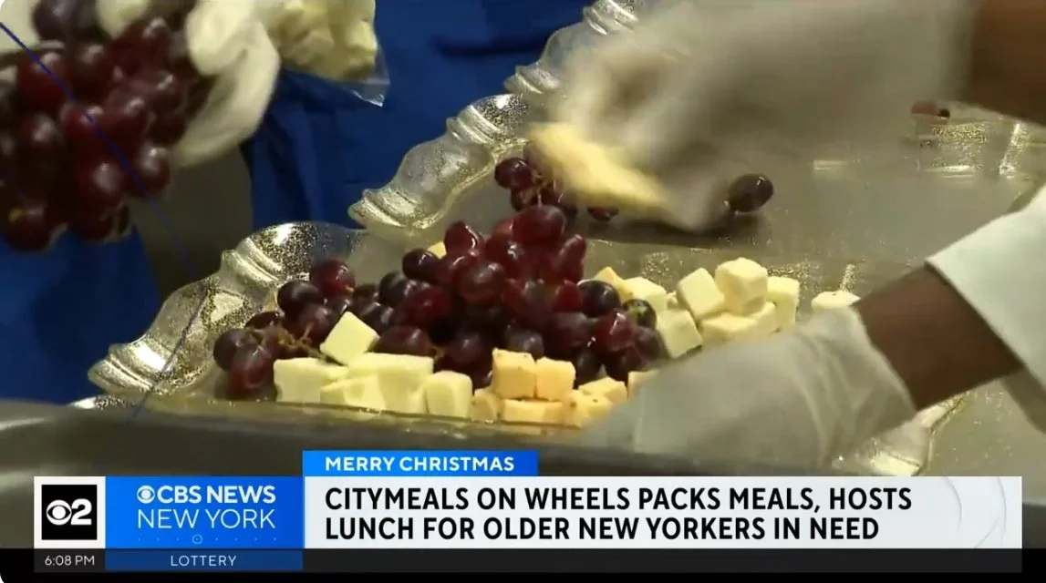 CBS 2: Carter Burden Network and Citymeals on Wheels Packs Christmas Meals, Hosts Lunch for Older Adults