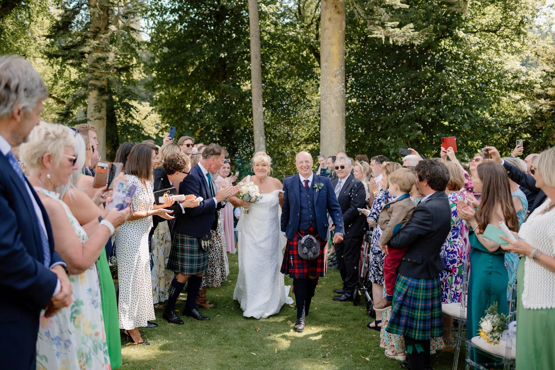 So it turns out you can still party in a heatwave and T&amp;A's family certainly raised the roof for this gorgeous wedding at Dunkeld House Hotel. Tricia wanted a big family get together to celebrate her marriage to Alastair and was keen to focus the