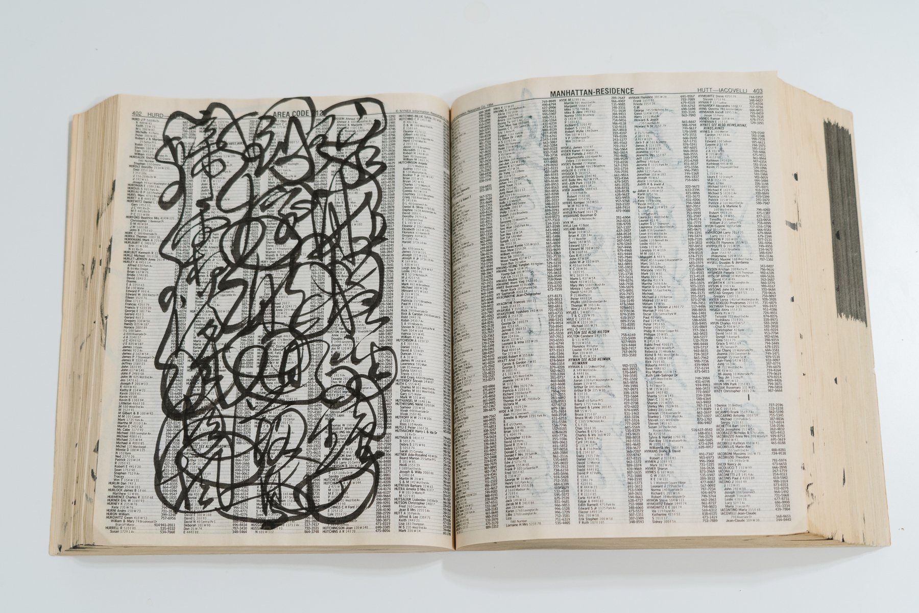  C. C. Wang, no title (Phonebook with Artist’s Calligraphy Practice), 1998. Ink on telephone book, 10 ¾ x 19 ½ x 2 inches (27.3 × 49.5 × 5.1 cm). Private Collection. Image copyright the Estate of C.C. Wang. Photo: Fu Qiumeng Fine Art. 