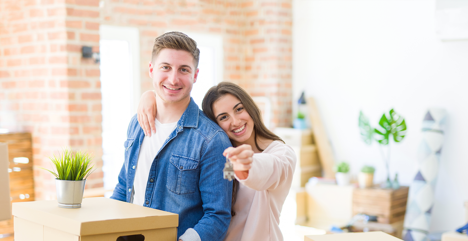couple-moving-in-with-keys.png