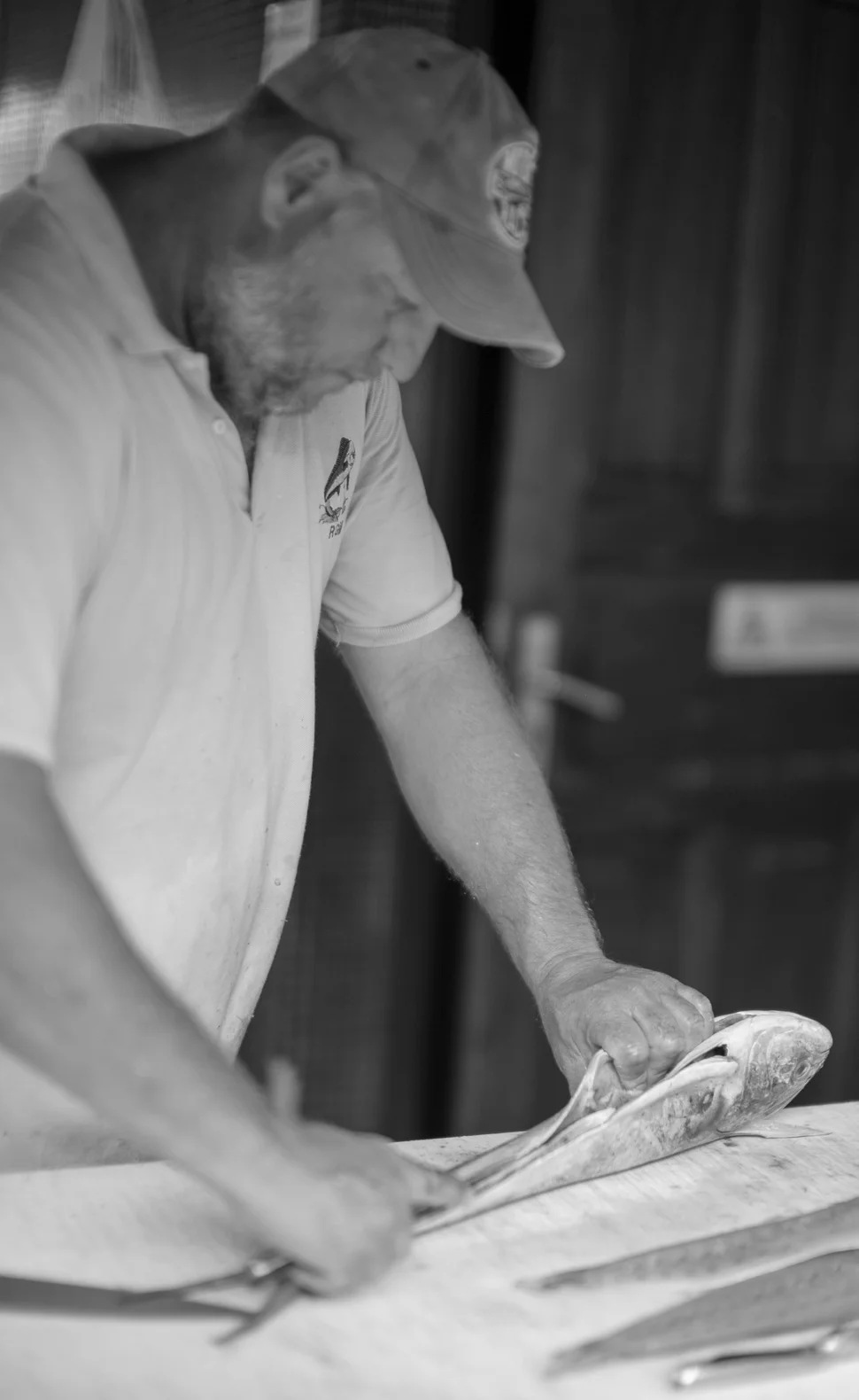 Fisherman at Fish Market / Pêcheur à la Poissonnerie - Gustavia