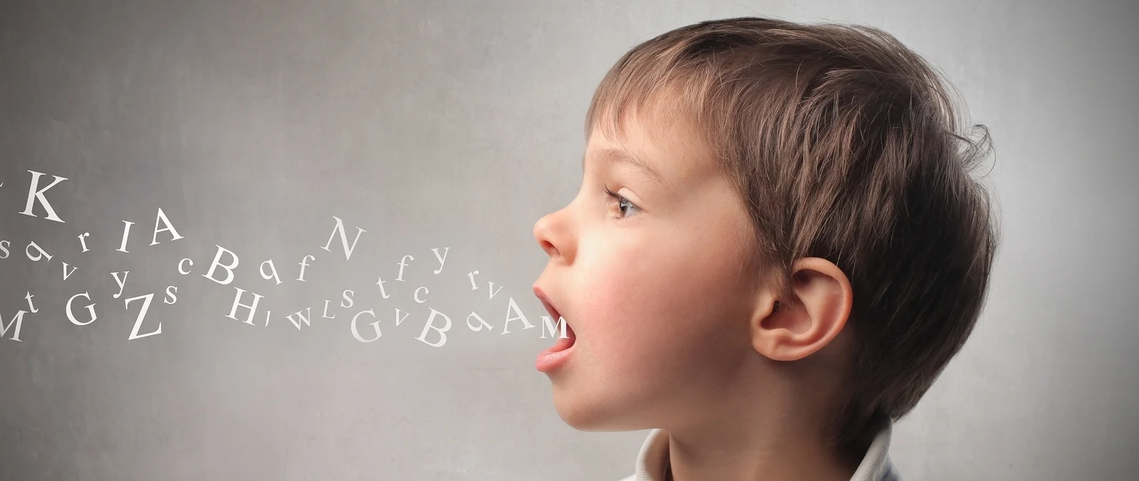 bigstock-Child-speaking-and-alphabet-le-18001274.jpg