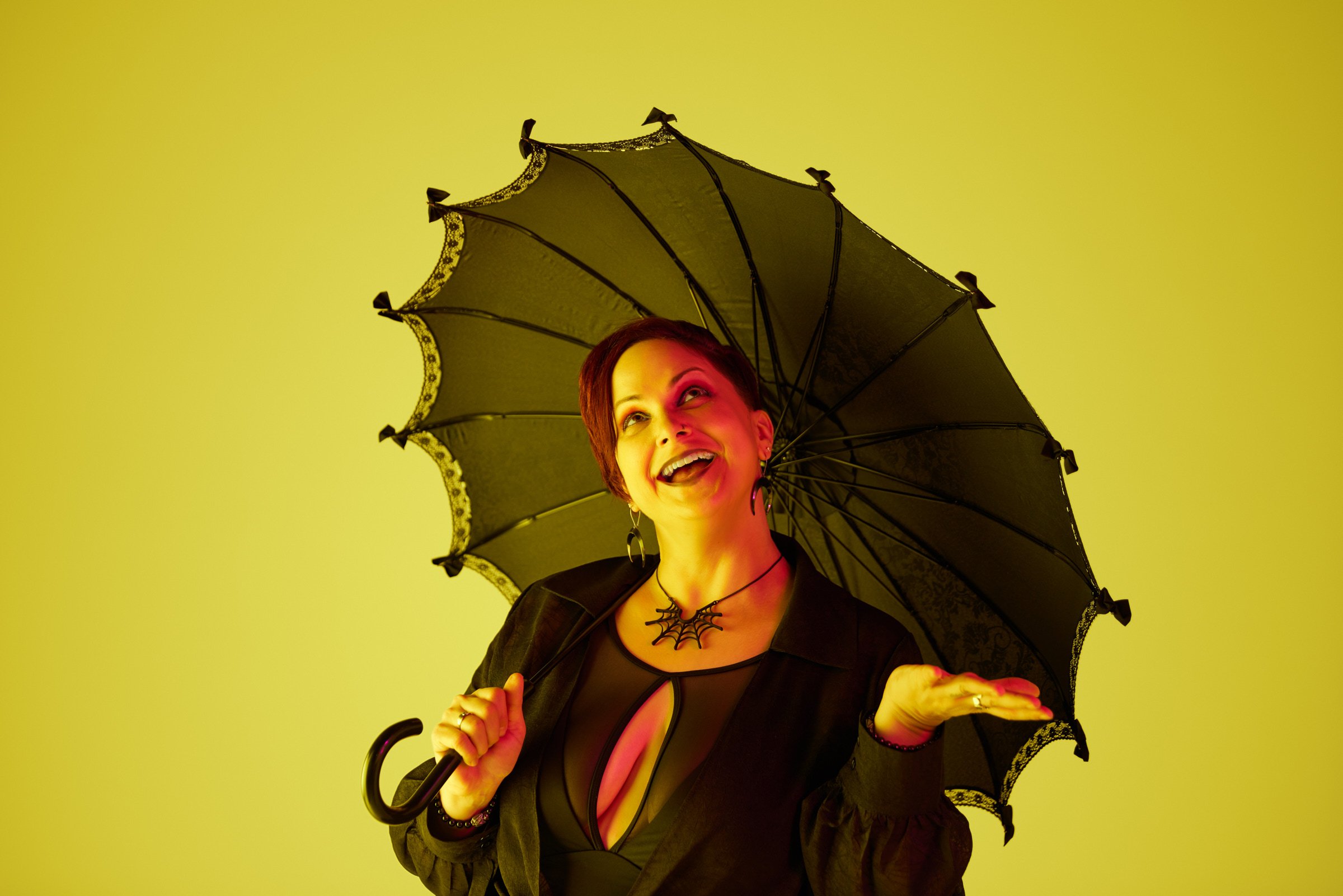 studio-portrait-woman-yellow-umbrella.jpg