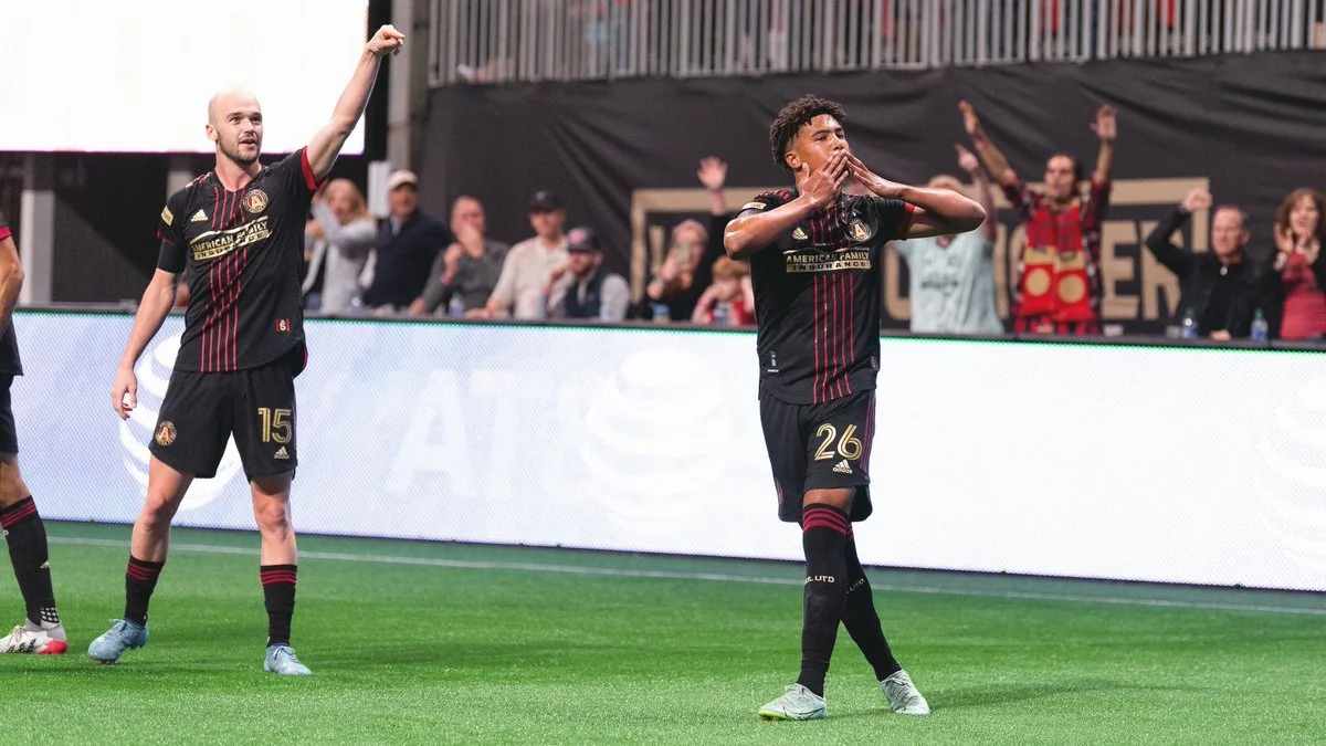 Caleb Wiley (26) celebrates his first career MLS goal