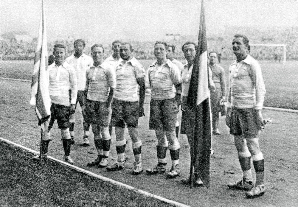 The Uruguay players at the 1924 Games. Andrade stands back from his teammates, second from left // PA Images