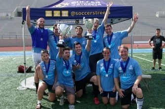 Team Salesforce raising the Championship Cup