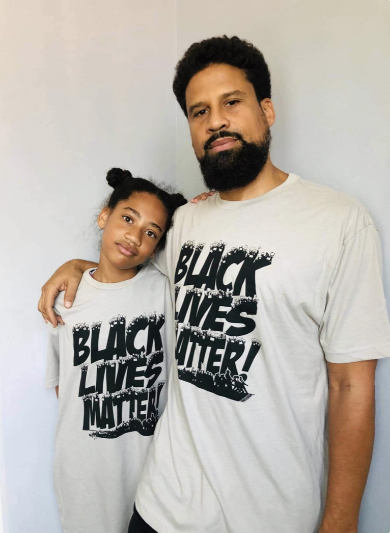 Sean Irving and his daughter supporting the BLM t-shirt