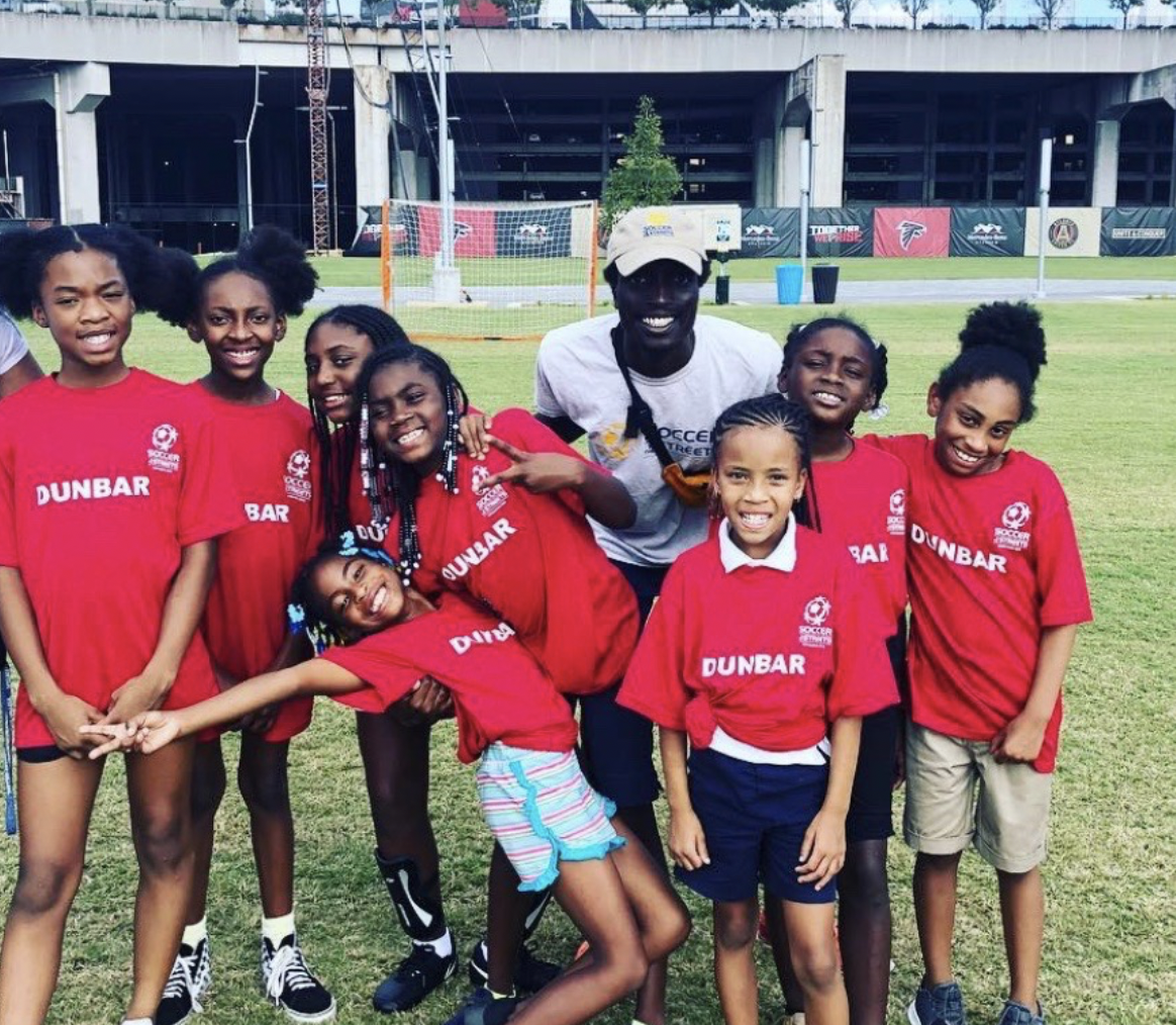 Coach Joel with Dunbar Youth Players