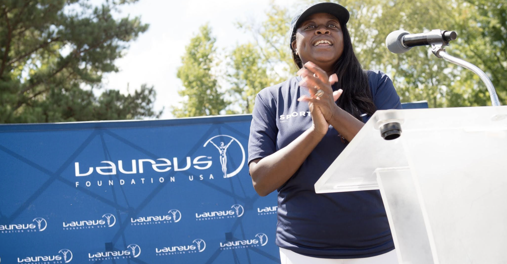 Pharlone Toussaint speaking at Laureus Sport For Good Foundation event