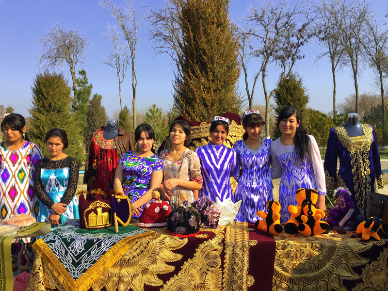  Laying out a celebratory table for Navruz, the Central Asian New Year Photo credit: Abdu Samadov 