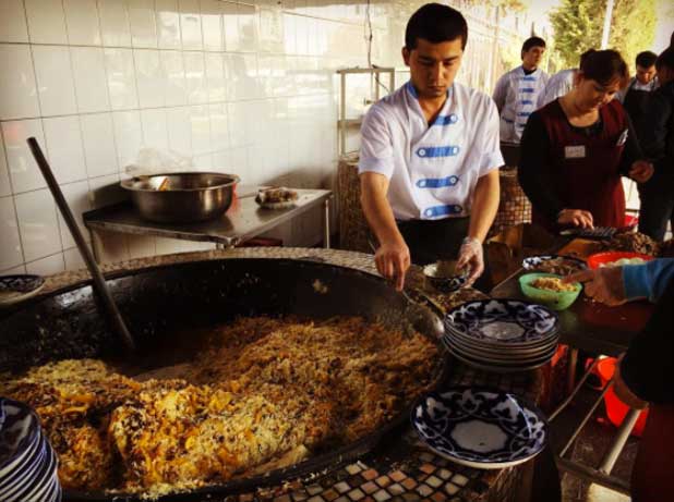   Giant caldrons are used to make massive quantities of  plov    Photo credit: Douglas Grimes 