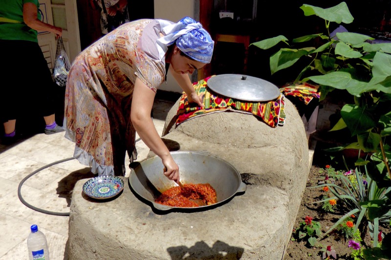   A local family cooks up  plov   on their terrace  Photo credit: Jan &amp; Allen Gerstenberger 