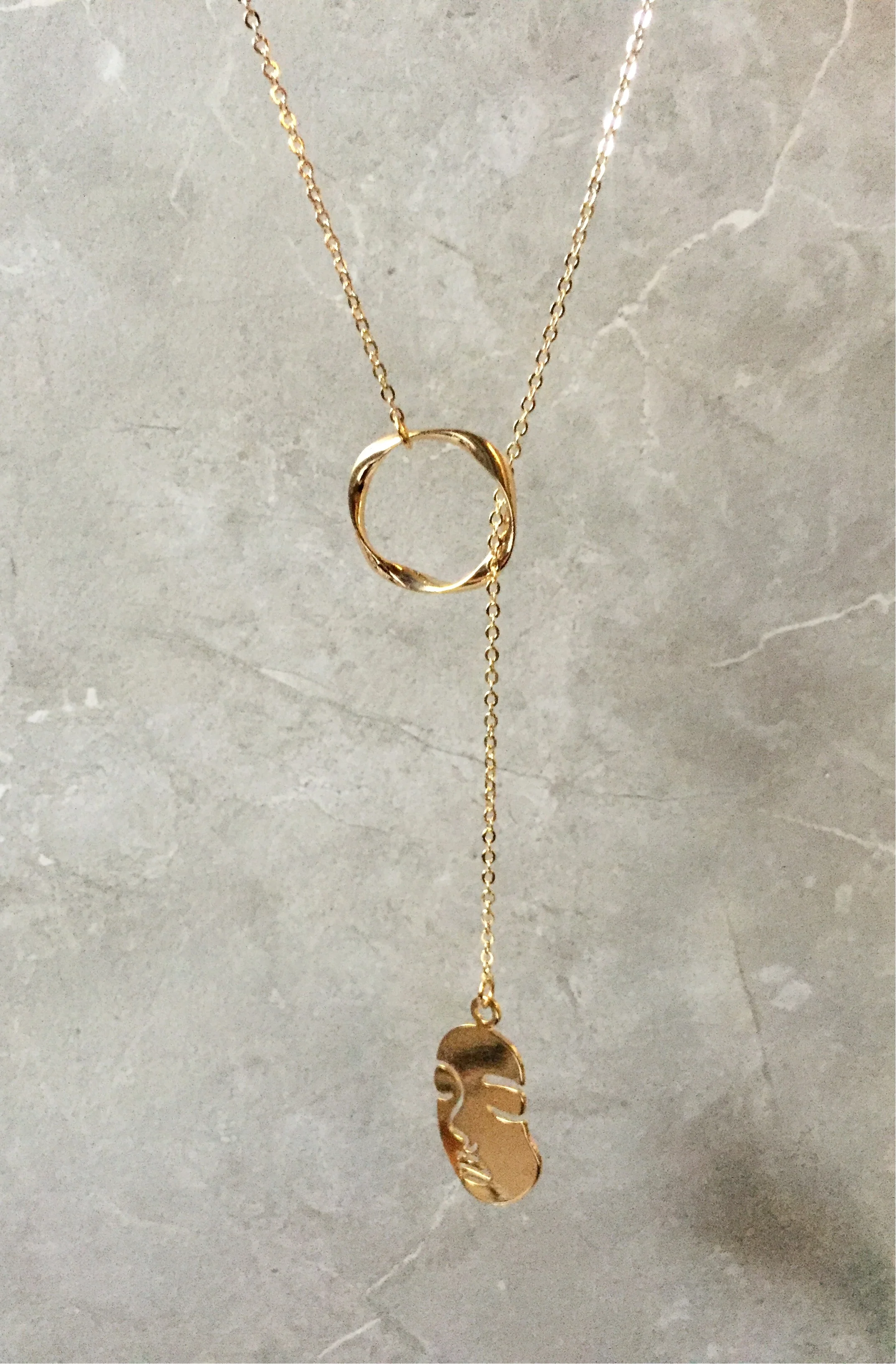 face necklace