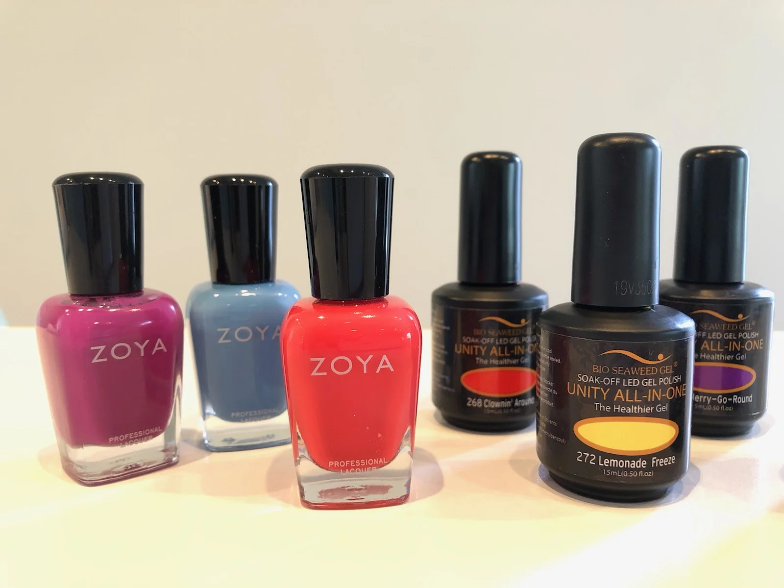 Their hottest hues from left to right: Nana (saturated fuchsia), Yummy (creamy blue) and Virginia (sexy coral/red), Clownin’ Around (coral), Lemonade Freeze (yellow!) and Merry-Go-Round (vivid violet).